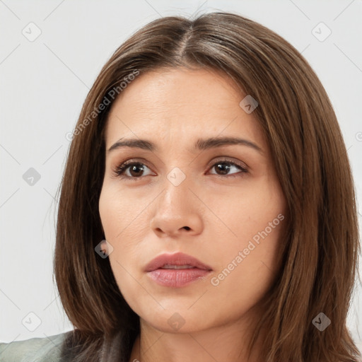 Neutral white young-adult female with long  brown hair and brown eyes