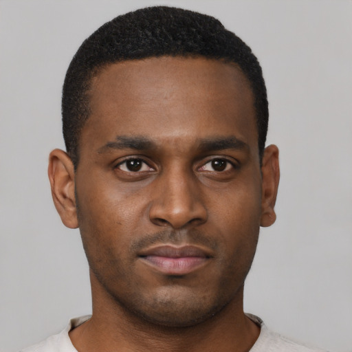 Neutral black young-adult male with short  brown hair and brown eyes