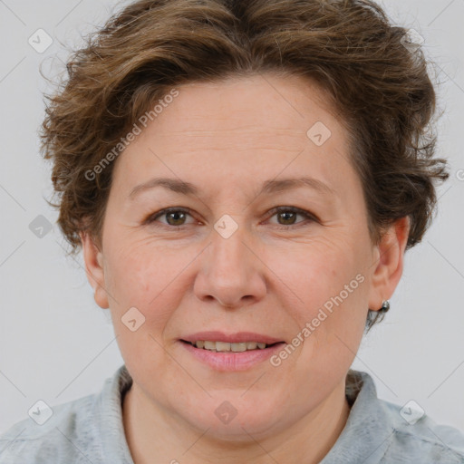 Joyful white adult female with short  brown hair and brown eyes