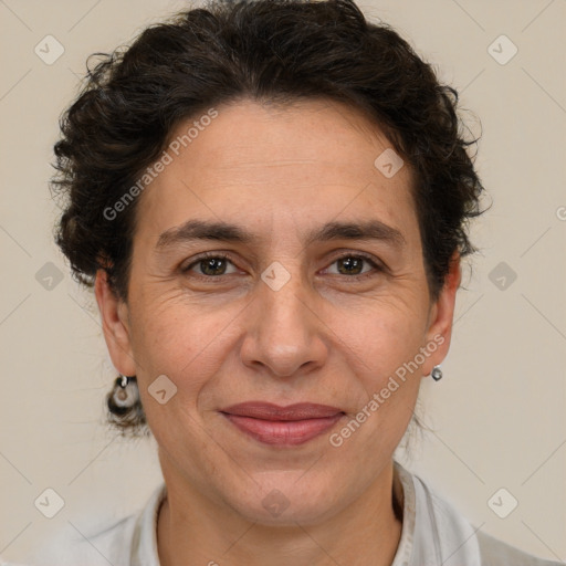 Joyful white adult female with short  brown hair and brown eyes