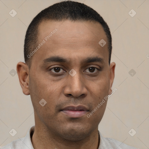 Neutral latino young-adult male with short  brown hair and brown eyes