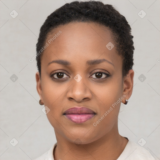 Joyful black young-adult female with short  brown hair and brown eyes