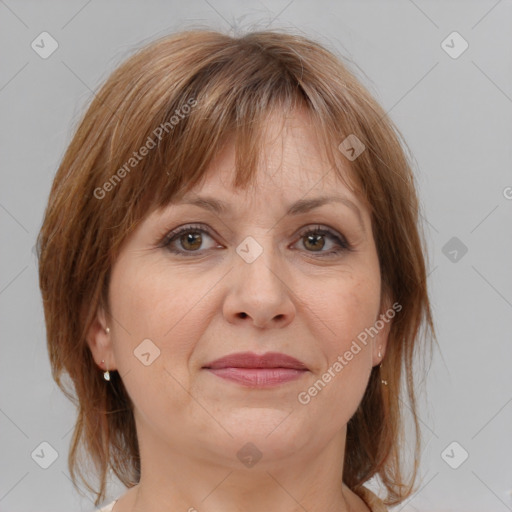 Joyful white adult female with medium  brown hair and grey eyes