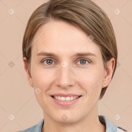 Joyful white young-adult female with short  brown hair and grey eyes