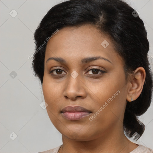 Joyful black young-adult female with medium  brown hair and brown eyes