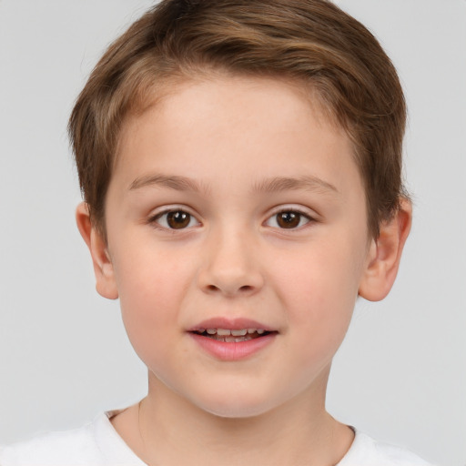 Joyful white child female with short  brown hair and brown eyes