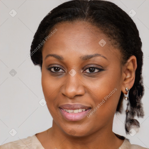 Joyful black young-adult female with medium  brown hair and brown eyes