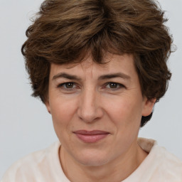 Joyful white adult female with short  brown hair and brown eyes