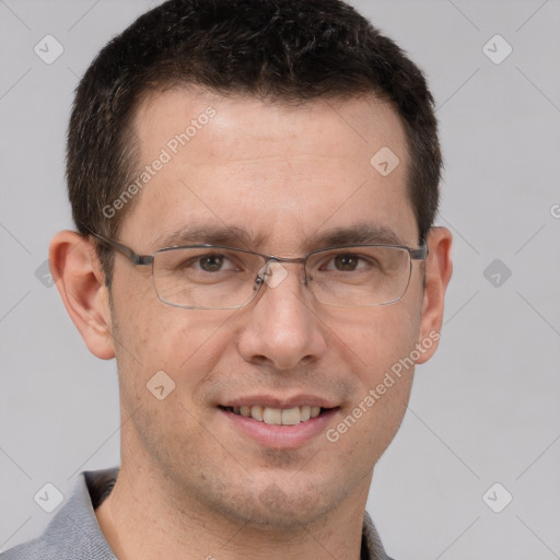 Joyful white adult male with short  brown hair and brown eyes