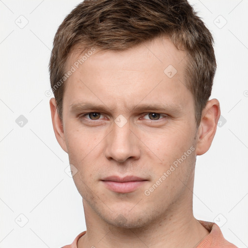 Neutral white young-adult male with short  brown hair and brown eyes