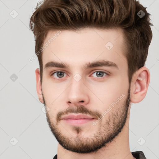 Neutral white young-adult male with short  brown hair and brown eyes