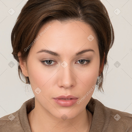 Neutral white young-adult female with medium  brown hair and brown eyes