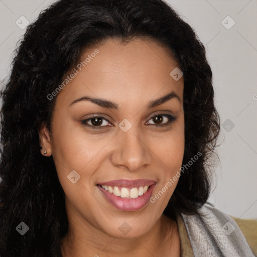 Joyful latino young-adult female with long  brown hair and brown eyes