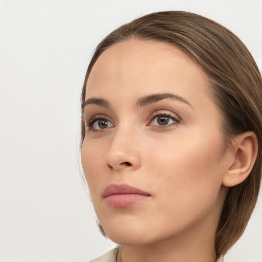 Neutral white young-adult female with long  brown hair and brown eyes