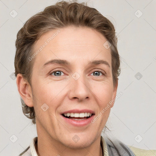 Joyful white adult female with short  brown hair and grey eyes