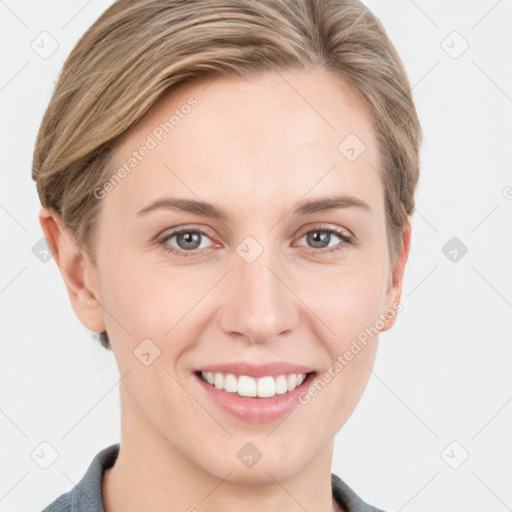 Joyful white young-adult female with short  brown hair and grey eyes