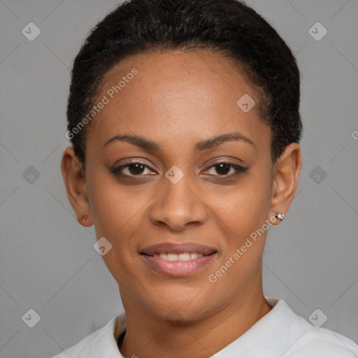 Joyful black young-adult female with short  black hair and brown eyes