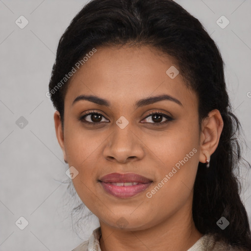 Joyful black young-adult female with medium  black hair and brown eyes