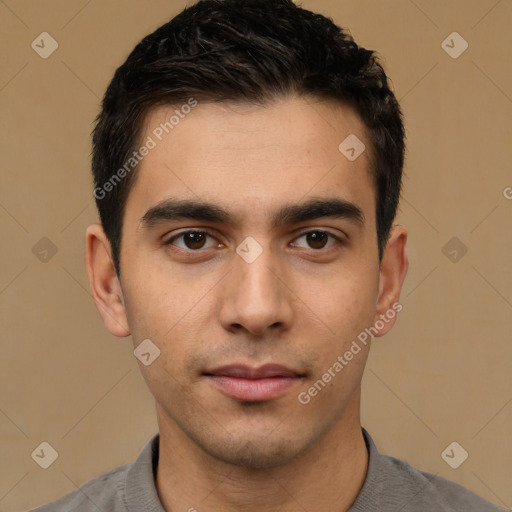 Joyful white young-adult male with short  black hair and brown eyes