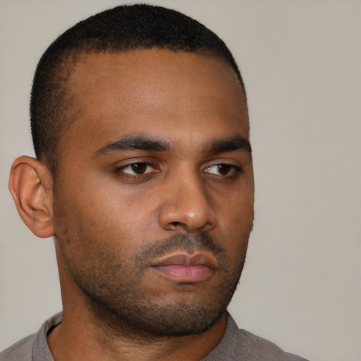 Neutral latino young-adult male with short  brown hair and brown eyes