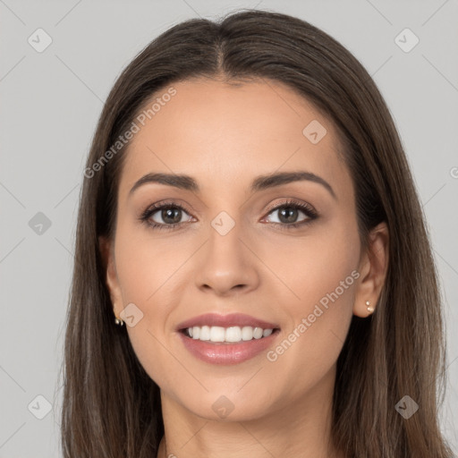 Joyful white young-adult female with long  brown hair and brown eyes