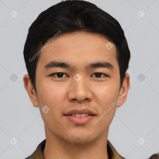 Joyful asian young-adult male with short  black hair and brown eyes