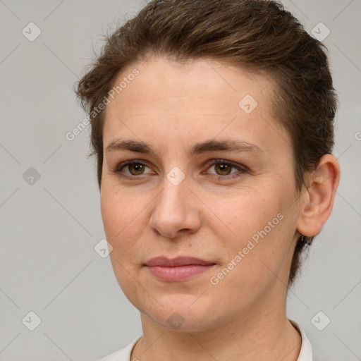 Joyful white young-adult female with short  brown hair and brown eyes