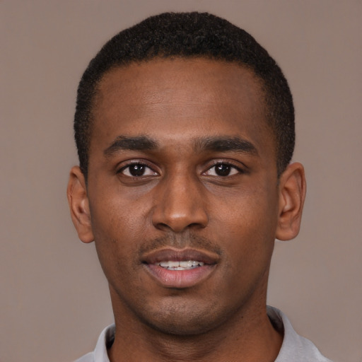 Neutral black young-adult male with short  black hair and brown eyes