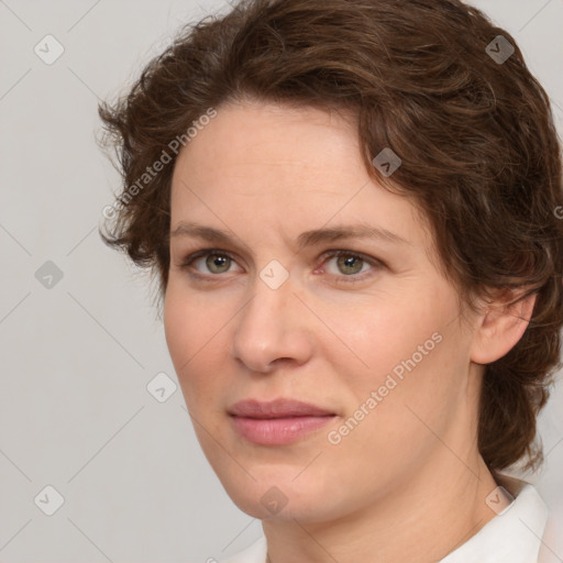 Joyful white young-adult female with medium  brown hair and green eyes