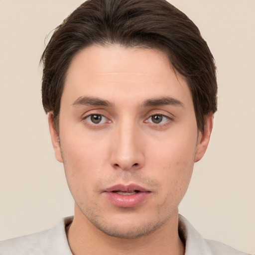 Neutral white young-adult male with short  brown hair and brown eyes