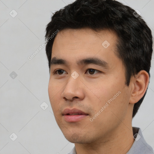 Neutral asian young-adult male with short  black hair and brown eyes