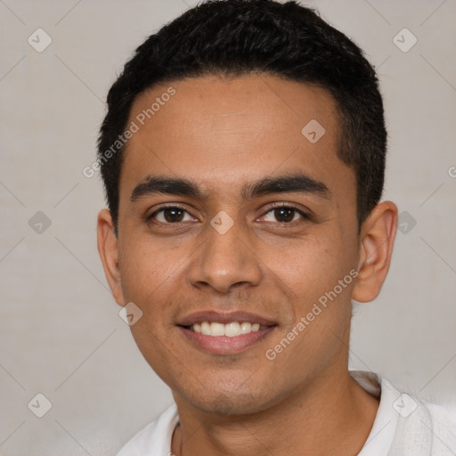 Joyful latino young-adult male with short  black hair and brown eyes