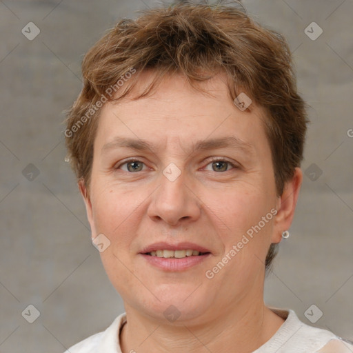 Joyful white adult female with short  brown hair and brown eyes