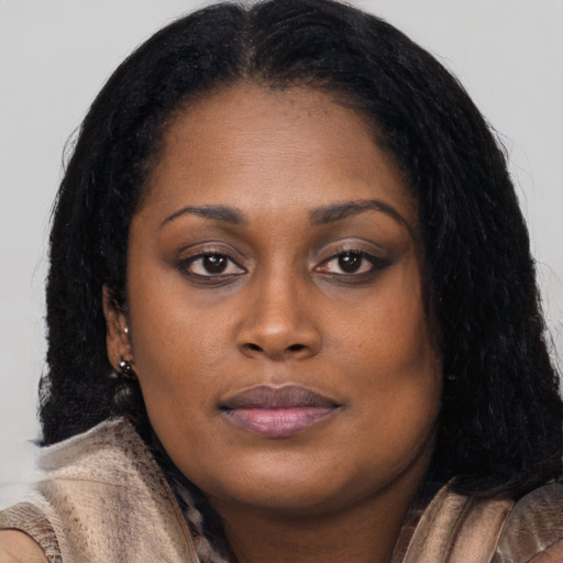 Neutral latino young-adult female with long  black hair and brown eyes