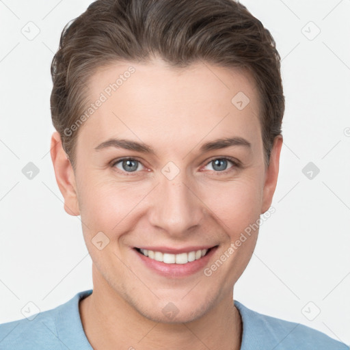 Joyful white young-adult female with short  brown hair and grey eyes