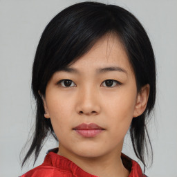 Neutral asian young-adult female with medium  black hair and brown eyes