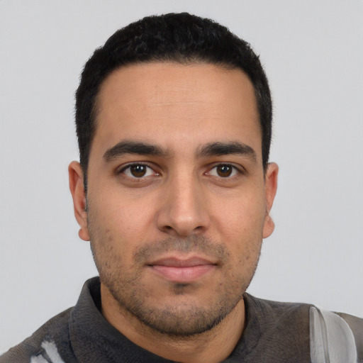 Neutral white young-adult male with short  black hair and brown eyes