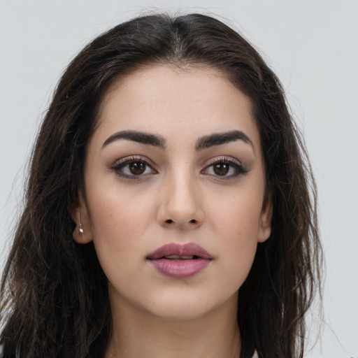 Neutral white young-adult female with long  brown hair and brown eyes