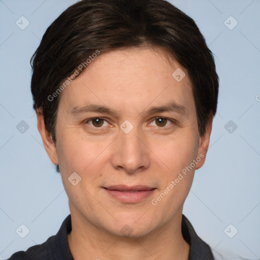 Joyful white adult male with short  brown hair and brown eyes