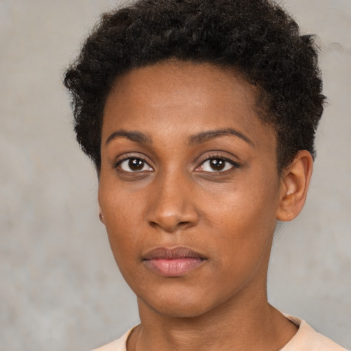 Neutral black young-adult female with short  brown hair and brown eyes