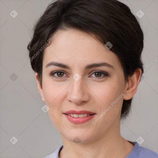 Joyful white young-adult female with short  brown hair and brown eyes