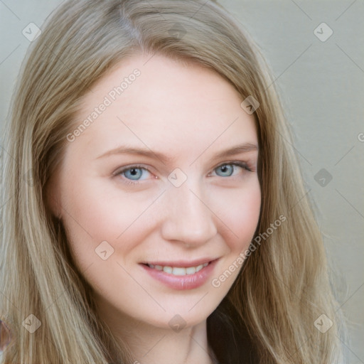 Joyful white young-adult female with long  brown hair and blue eyes