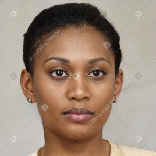 Neutral black young-adult female with short  brown hair and brown eyes