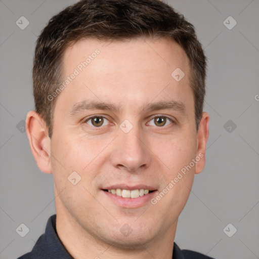 Joyful white young-adult male with short  brown hair and brown eyes