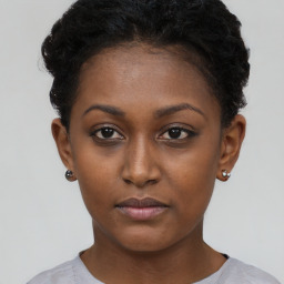 Neutral black young-adult female with short  brown hair and brown eyes