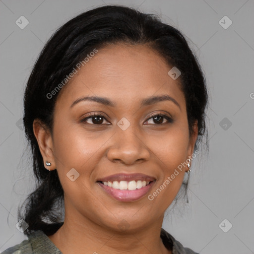 Joyful latino young-adult female with medium  brown hair and brown eyes