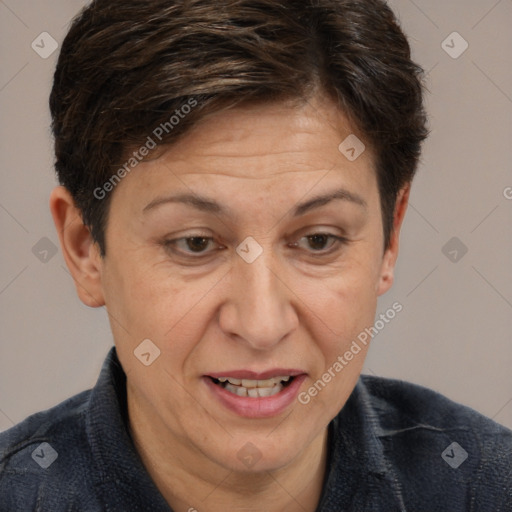 Joyful white adult female with short  brown hair and brown eyes