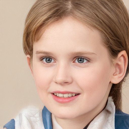 Joyful white child female with medium  brown hair and blue eyes