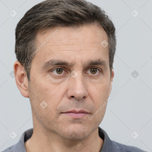 Neutral white adult male with short  brown hair and brown eyes