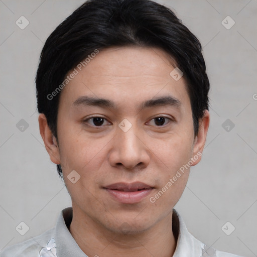 Joyful white young-adult male with short  black hair and brown eyes